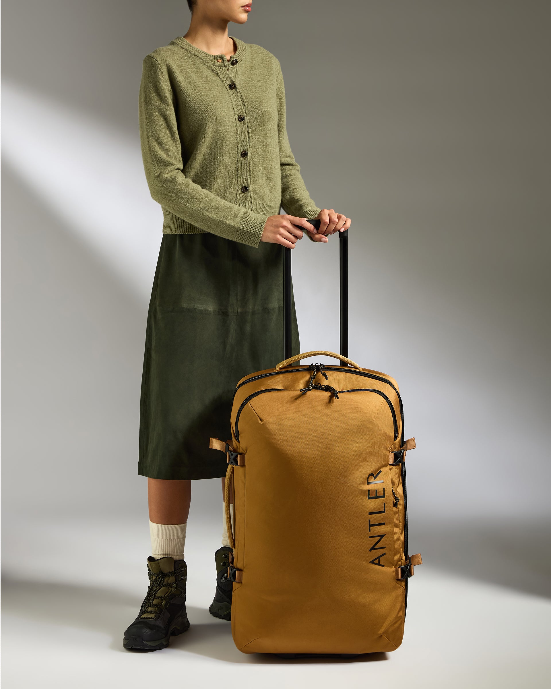 Discovery Wheeled Duffel in Mustard Yellow