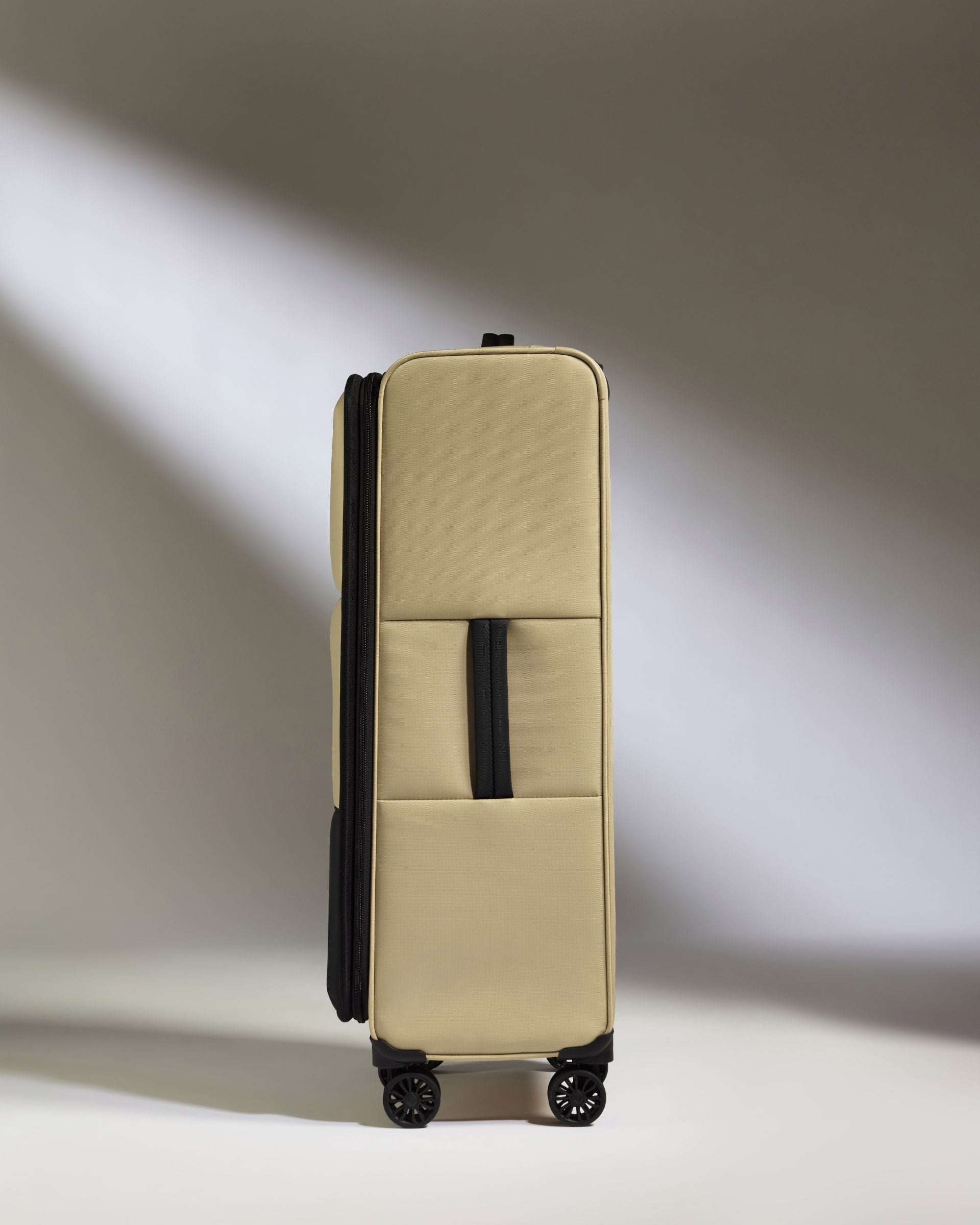 Lightest Large Luggage in Sand - Soft Stripe 2.0