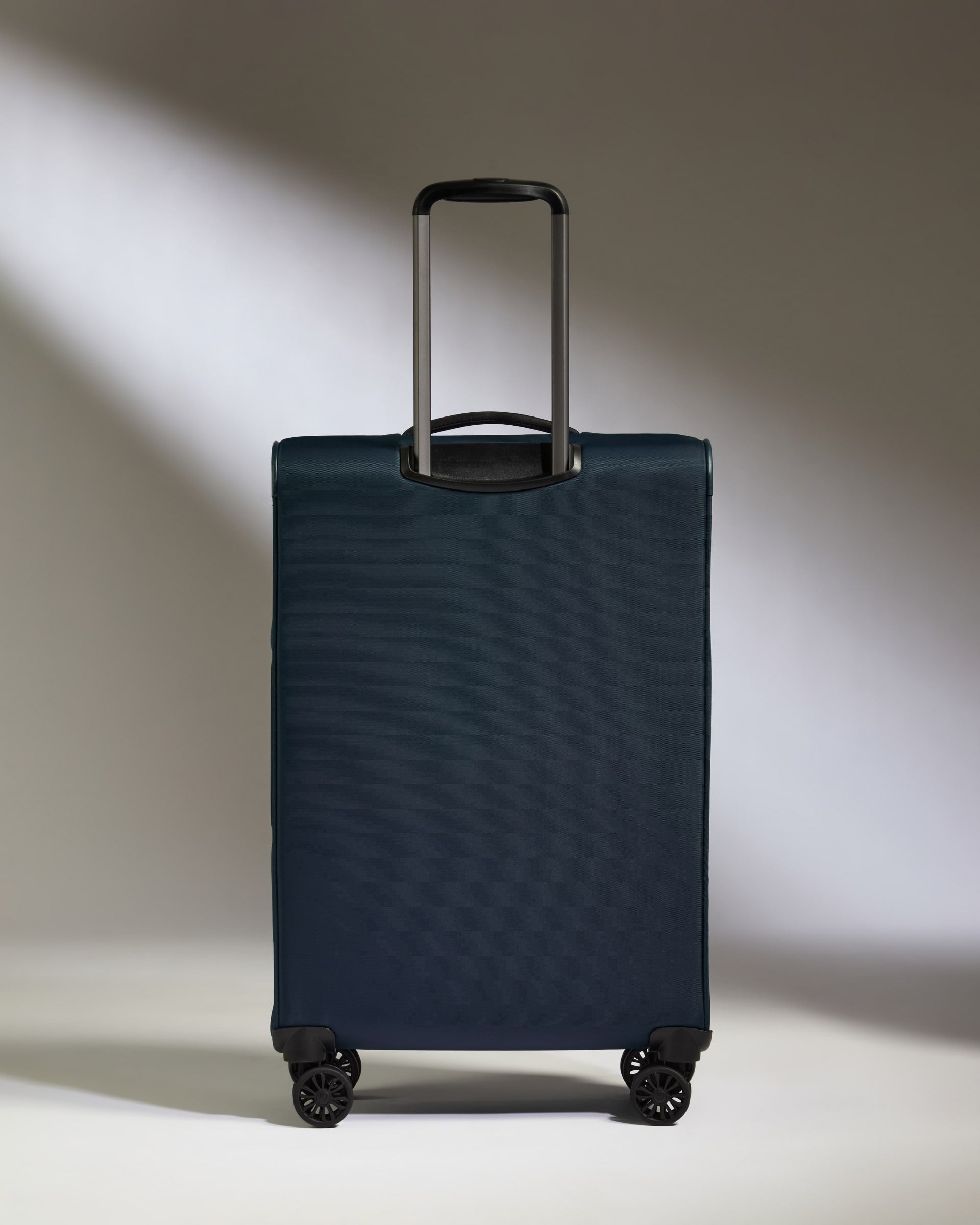 Lightest Medium Luggage in Indigo Blue - Soft Stripe 2.0
